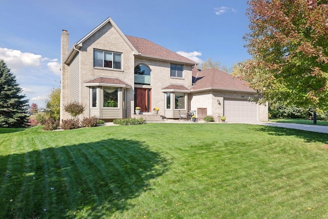 traditional-style home with brick siding, a chimney, a garage, driveway, and a front lawn