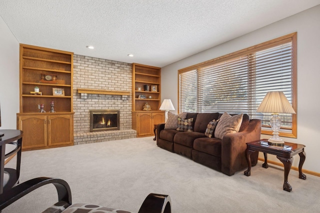 living room featuring a textured ceiling, a brick fireplace, light carpet, and baseboards