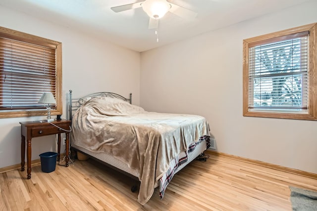 bedroom featuring ceiling fan and light wood-type flooring