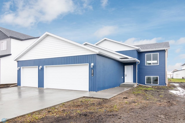 view of front of property featuring a garage