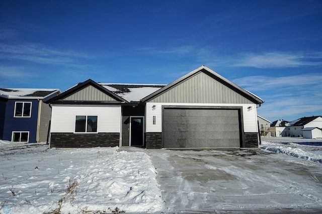 view of front of property with a garage