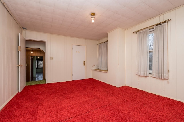 empty room with carpet flooring