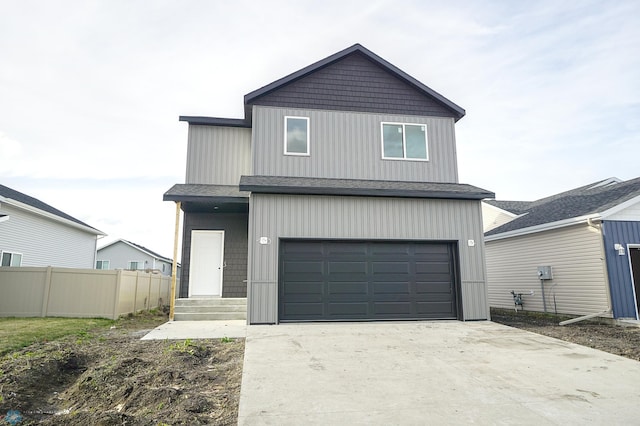 view of front of property with a garage