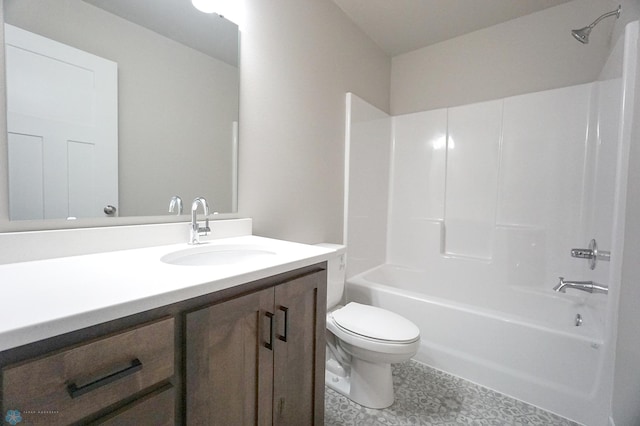 full bathroom with vanity, tub / shower combination, and toilet