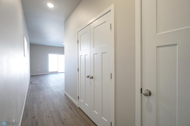 6020 80th Ave S, Fargo, ND 58047 - corridor featuring baseboards, wood finished floors, and recessed lighting