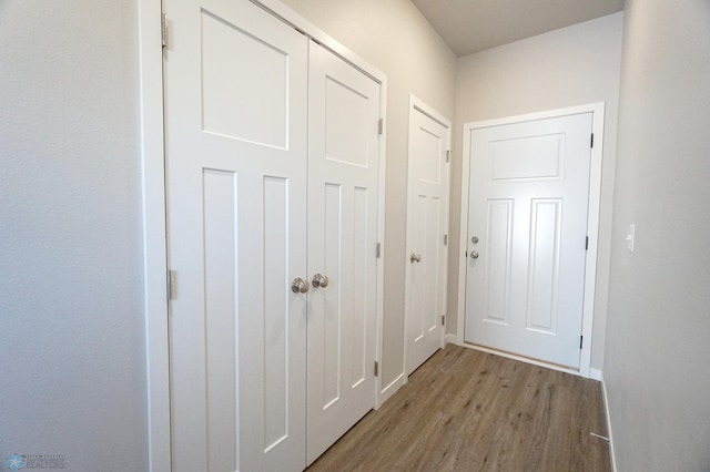 6020 80th Ave S, Fargo, ND 58047 - corridor with light wood-style floors and baseboards