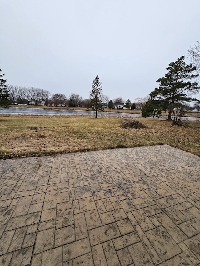 view of patio / terrace featuring a water view