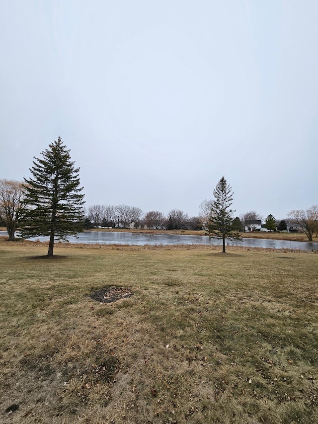 view of yard with a water view