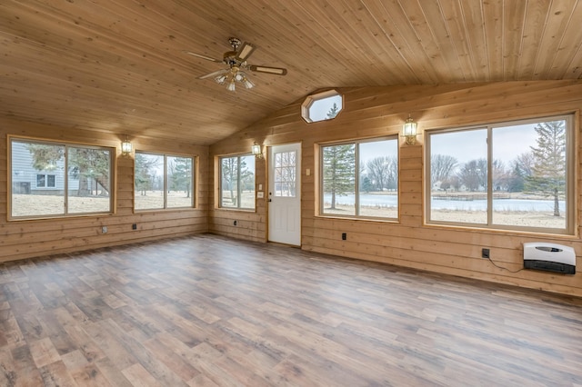 unfurnished sunroom featuring a water view, ceiling fan, lofted ceiling, and wood ceiling