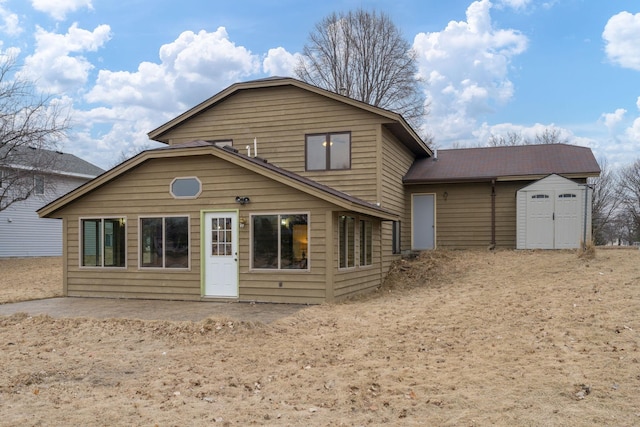 view of front facade featuring a patio and a storage unit