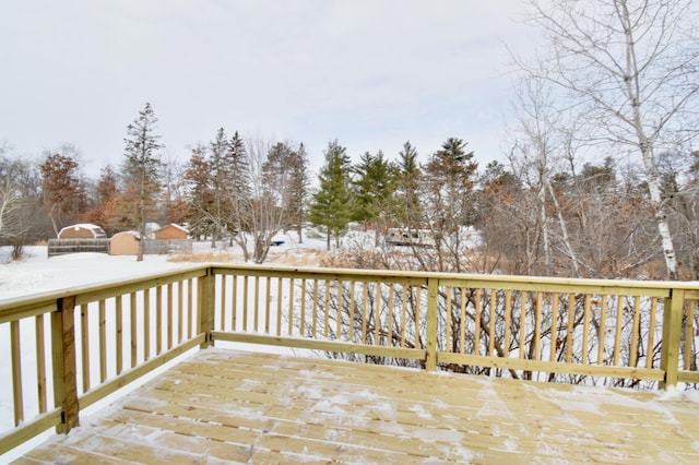 view of snow covered deck