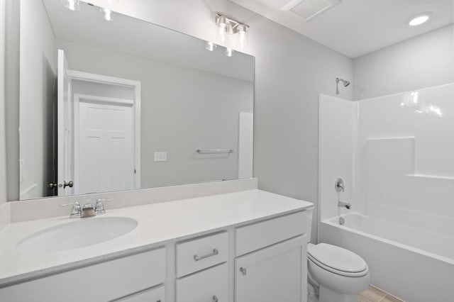 full bathroom with toilet, bathing tub / shower combination, vanity, and visible vents