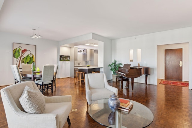 living room with dark parquet flooring