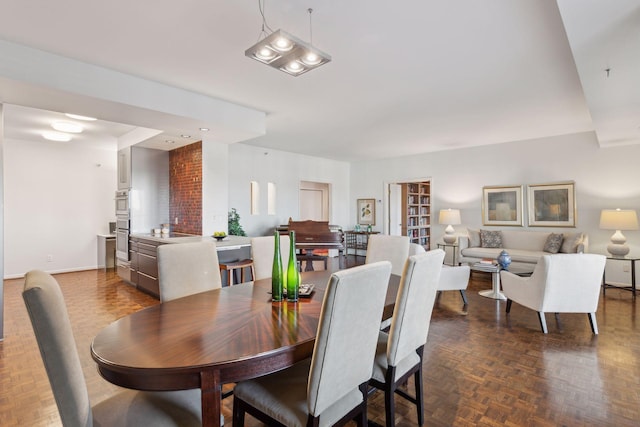 dining room with dark parquet floors