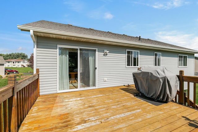 wooden deck featuring grilling area