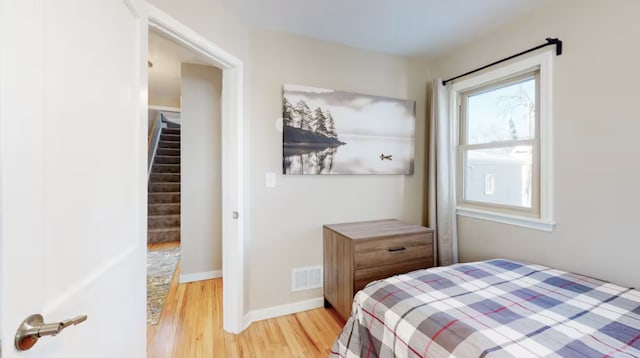 bedroom featuring hardwood / wood-style flooring