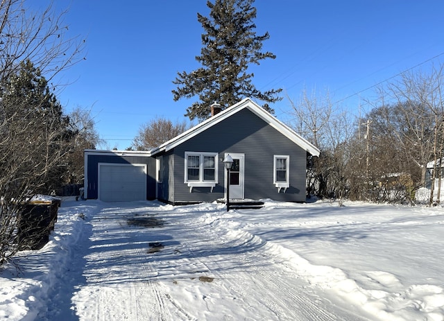 ranch-style house featuring a garage