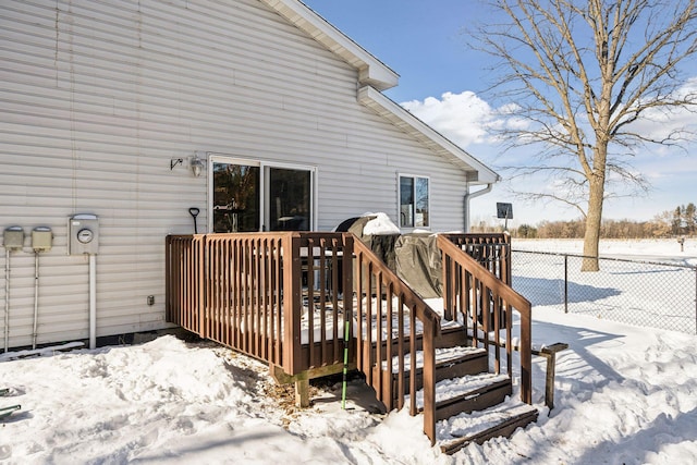 view of snow covered deck