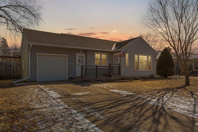 single story home with a garage