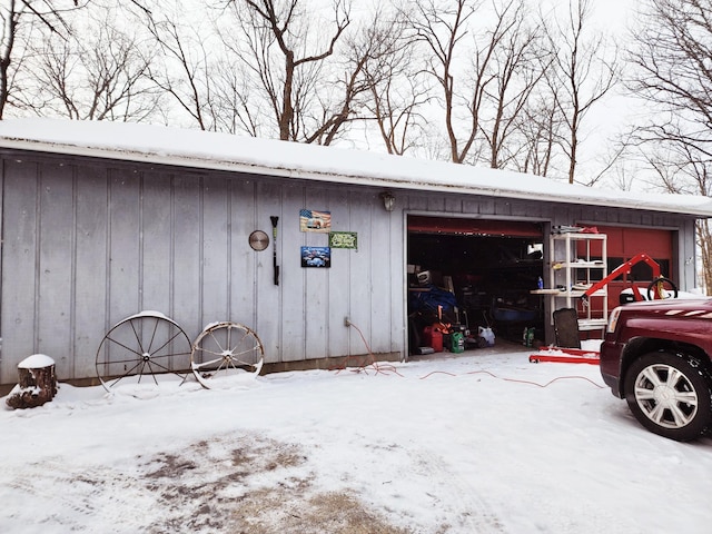 view of snow covered garage