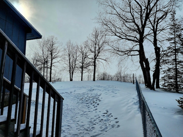 view of yard layered in snow