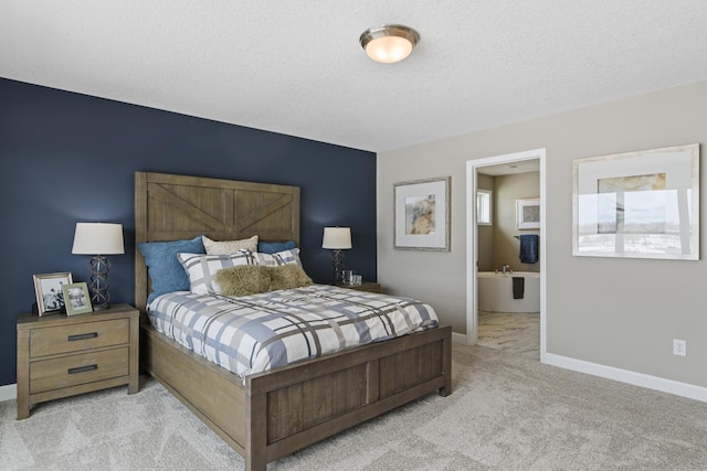 carpeted bedroom featuring a textured ceiling