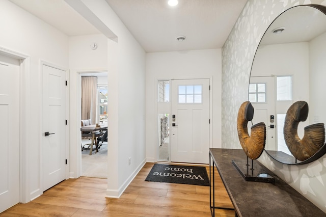 entryway with light wood-type flooring