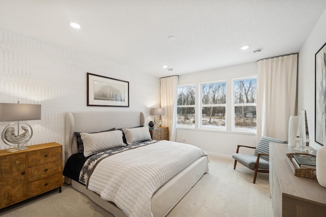 bedroom with light carpet