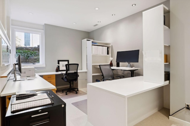 office space featuring recessed lighting