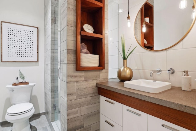 bathroom with toilet, a stall shower, tile walls, decorative backsplash, and vanity