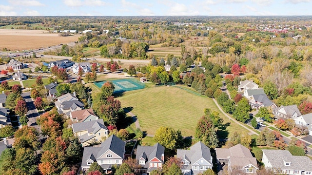 birds eye view of property with a residential view