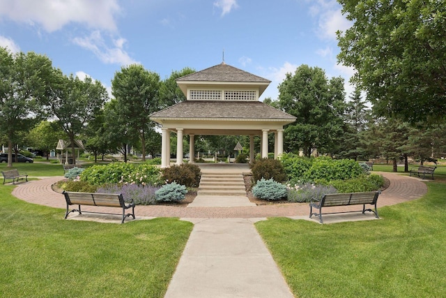 view of home's community with a gazebo and a lawn