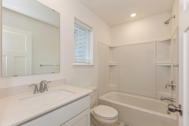 full bathroom featuring vanity, toilet, and tub / shower combination