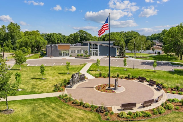 view of home's community with a lawn