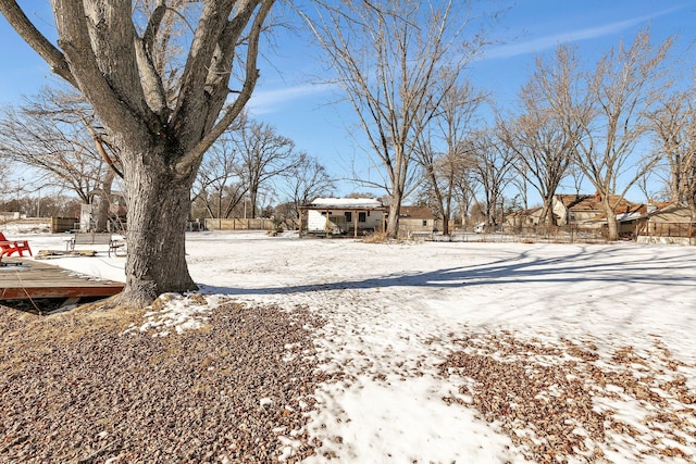 view of yard covered in snow