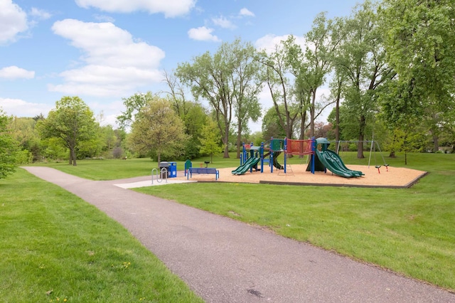 view of jungle gym with a lawn