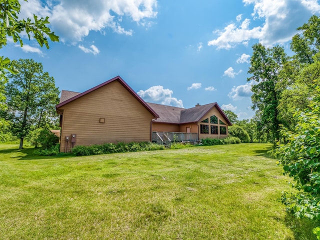 view of property exterior featuring a lawn