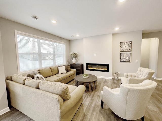 living room featuring light wood-type flooring