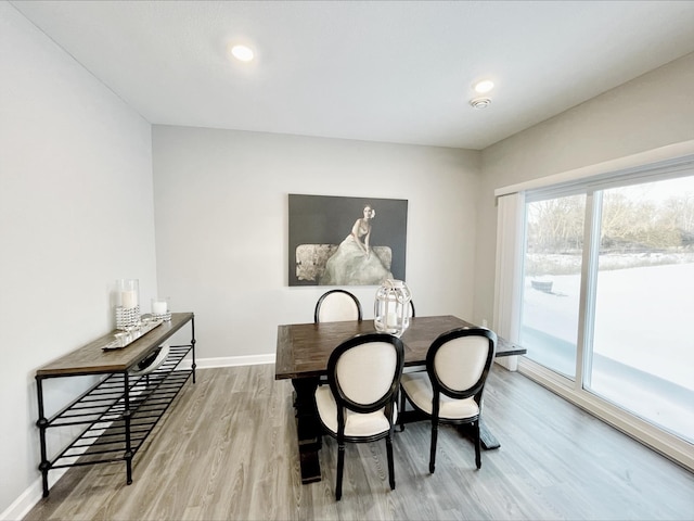 dining room with light hardwood / wood-style flooring