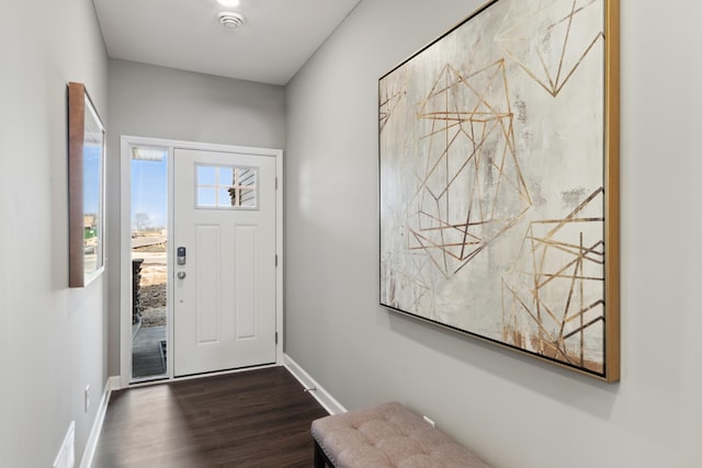 foyer with dark hardwood / wood-style flooring