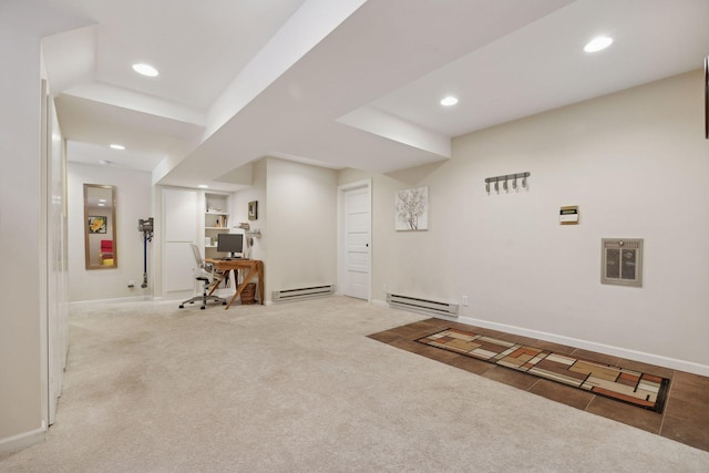 interior space with light carpet and baseboard heating