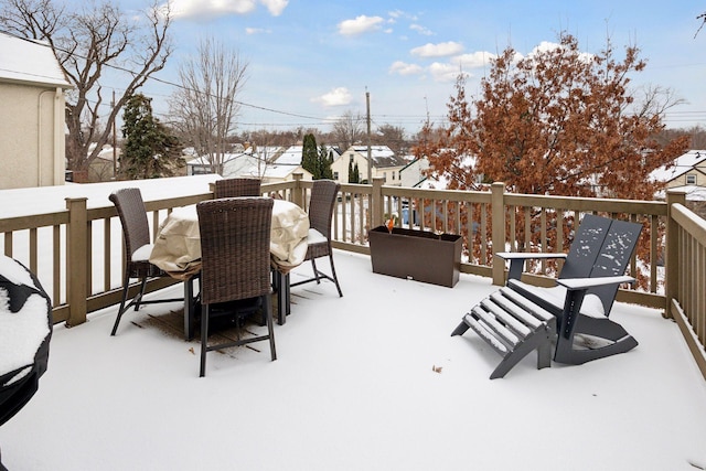 view of snow covered deck