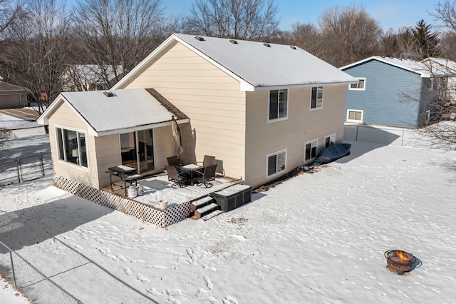 view of snow covered house