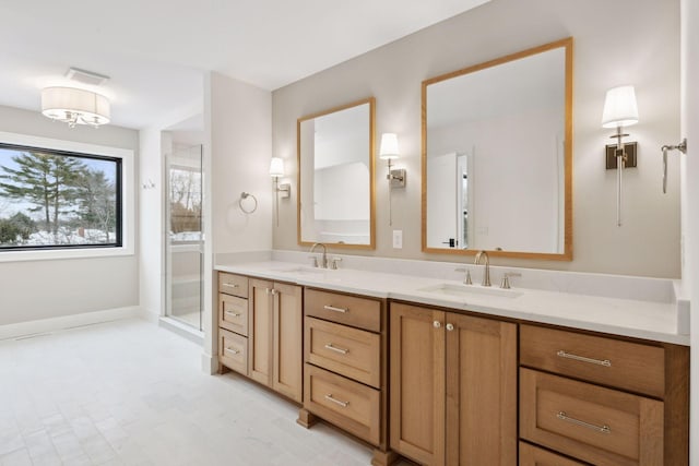 bathroom featuring vanity and a shower with door