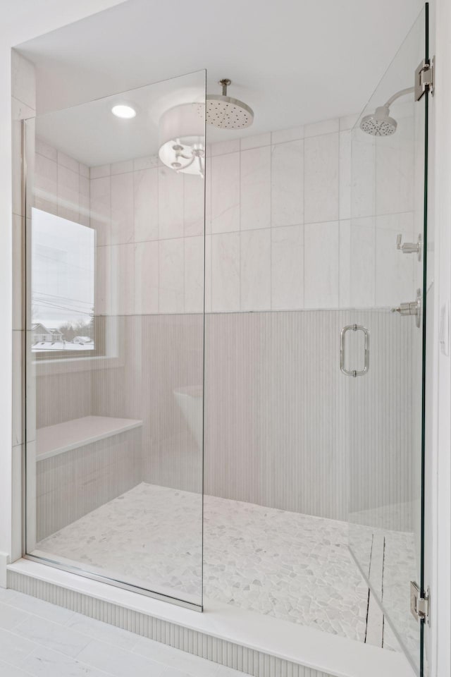 bathroom featuring an enclosed shower