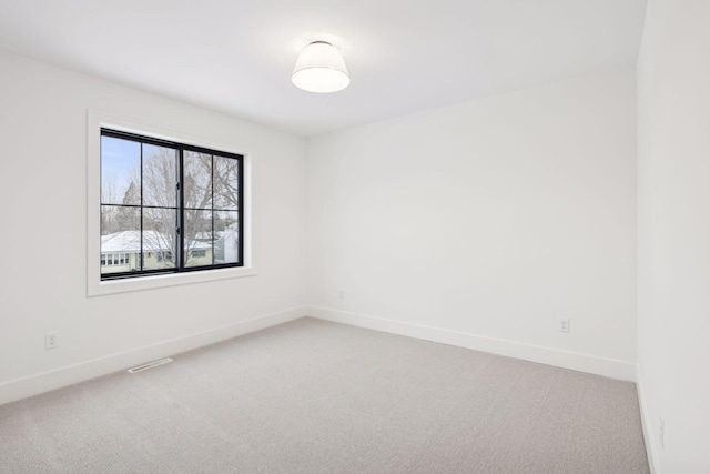 empty room featuring carpet floors