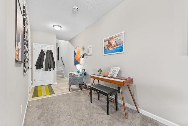 interior space featuring a textured ceiling