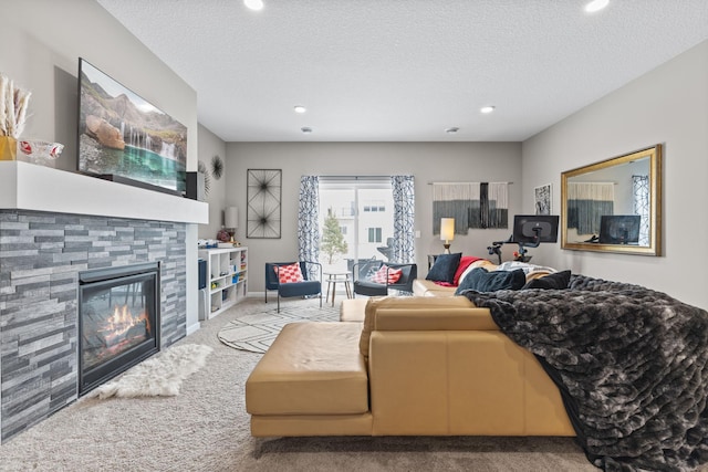 living room with light carpet and a textured ceiling