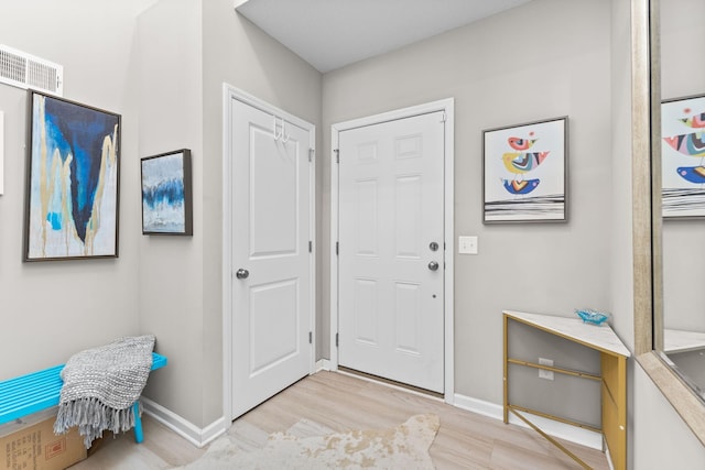 foyer featuring light hardwood / wood-style flooring