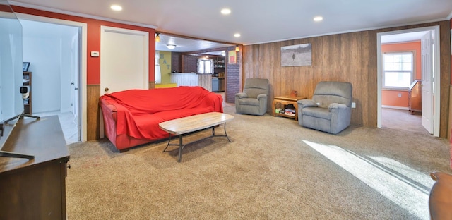 living room with carpet, recessed lighting, and crown molding
